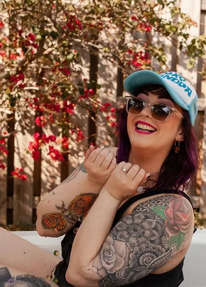 Portrait of tattoo artist Allie Kat of TBA Tattoos