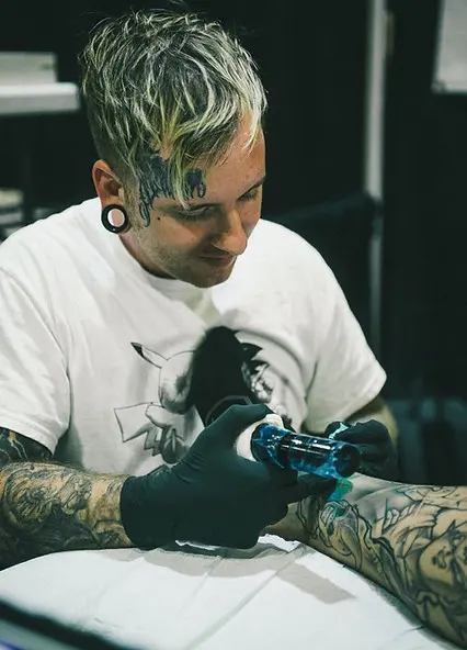 Portrait of tattoo artist Jake Keller of TBA Tattoos