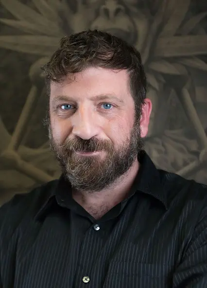 Portrait of tattoo artist Mike Asfour of TBA Tattoos