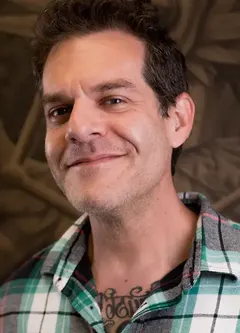 Portrait of tattoo artist Phil Carlucci of TBA Tattoos